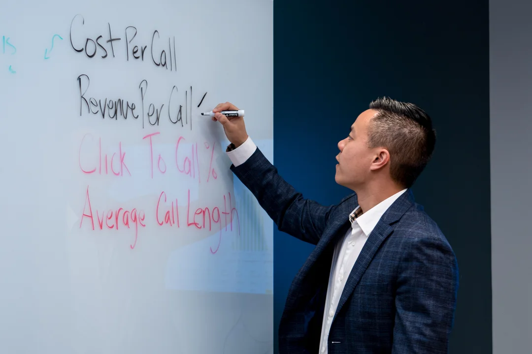 Ringba User Stories - Teddy Truong Writing on a Whiteboard